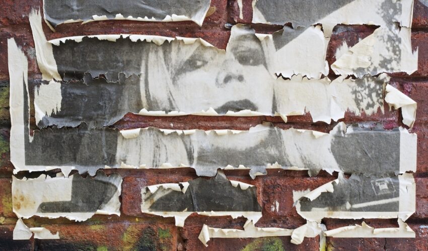 A weathered poster of Chelsea Manning
