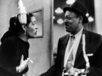 Lester Young and Billie Holiday talk to each other. Credit:  Lester Young and Billie Holiday, public domain.
