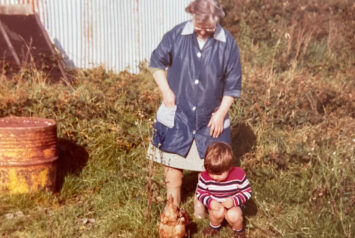Dan Fox as a child with his nain, or grandmother, in the chicken-filled yard of Siambr Wen, near Llanrwst, North Wales, UK