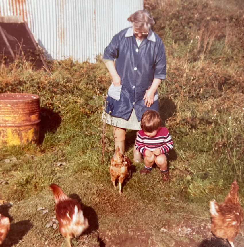Dan Fox as a child with his nain, or grandmother, in the chicken-filled yard of Siambr Wen, near Llanrwst, North Wales, UK