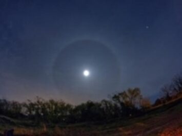 A photo of the moon in the night sky. Photo by David Dehetre.