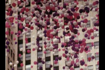 Release of pink and white balloons.