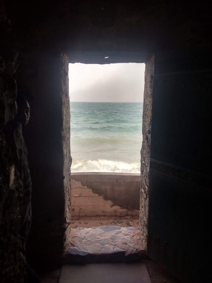 image of door of no return looking out onto ocean
