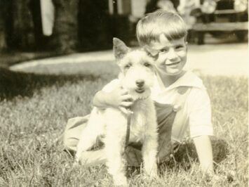 Young James Merrill with his pet terrier at "The Orchard" in 1930.
