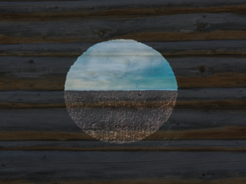 A view of a landscape through a circular opening. Illustration by NP Sullo